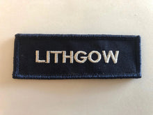 Load image into Gallery viewer, Navy blue name patch with grey text, sew-on backing