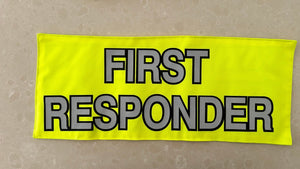 Two yellow rectangular signs with black text on a beige background