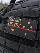 Load image into Gallery viewer, Thin red line Australian flag PVC patch on black tactical MOLLE webbing - Fire and Rescue
